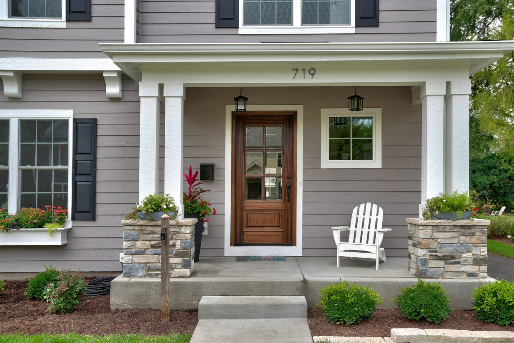 Beautiful windows with shutters and plants to welcome any visitor